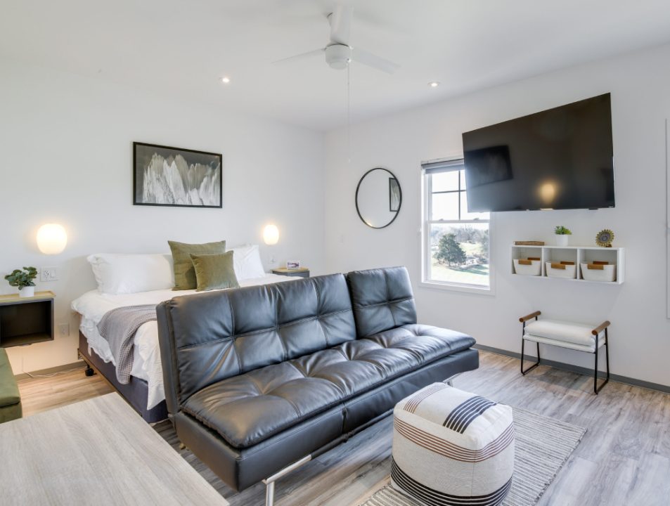 Milkbarn guest suite with king bed and lounge