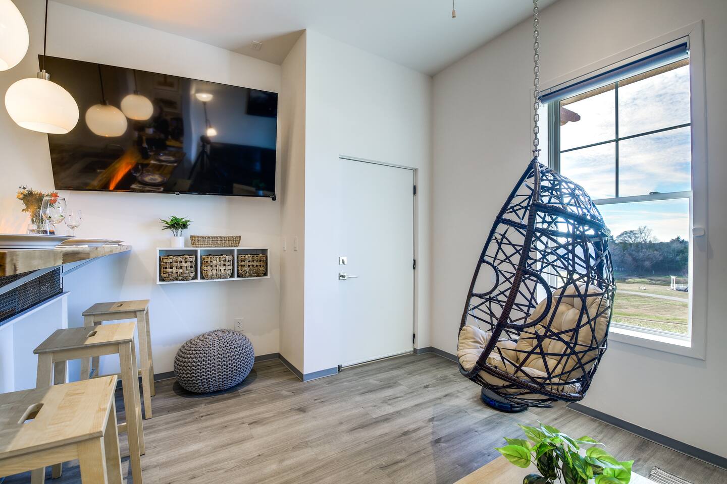 This is a big TV.  It is 70 inches in size and is a ROKU smart TV.  You also see the door to the adjacent unit if you want to connect both sides.