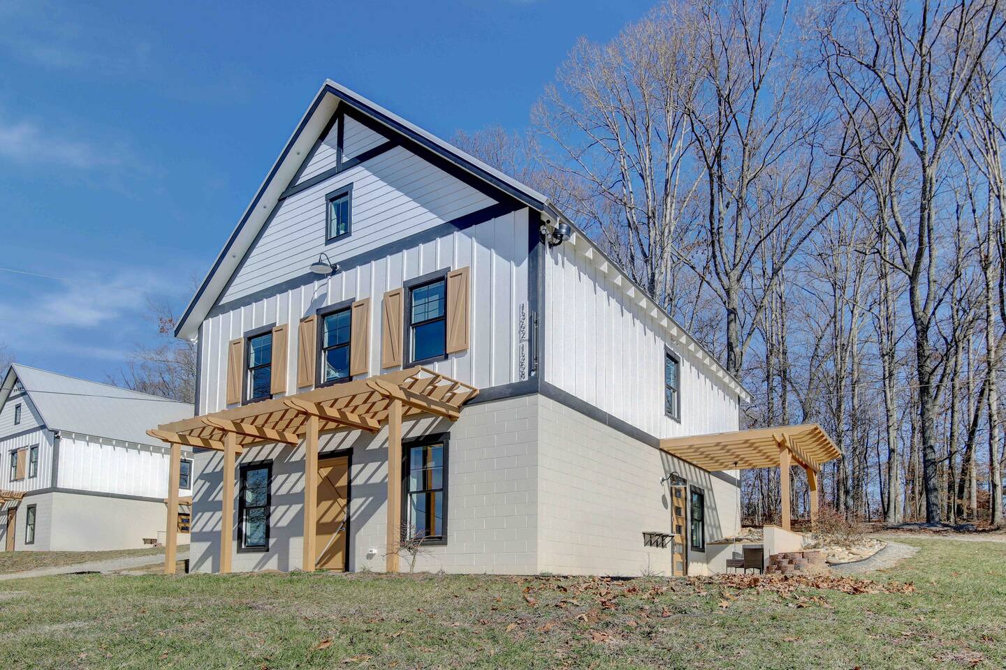 Barndo 2AS at Cedar Pond Farms — one-bedroom barndominium suite lodging on the farm, with the Highland herd a short walk away.