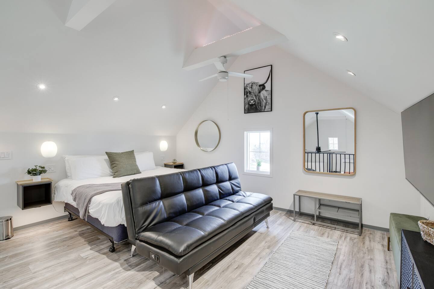 Barndo 2B at Cedar Pond Farms in Jefferson City — a three-bedroom barndominium on a working farm with Scottish Highland cattle.