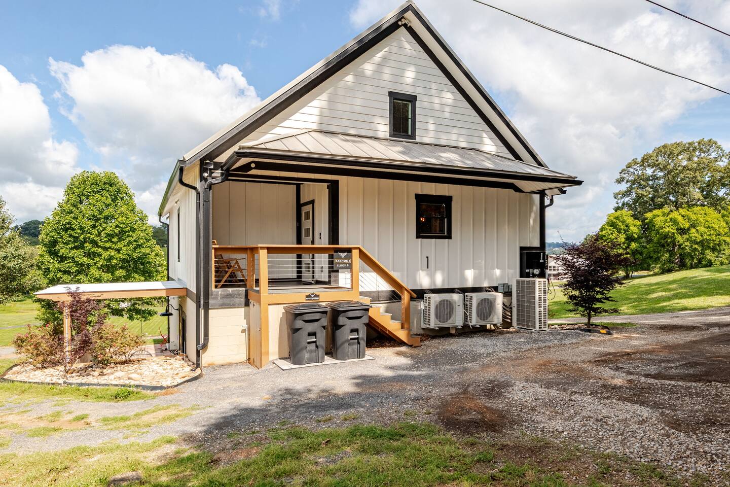 Inside Barndo 1 · Entire Building, a whole-barndominium rental at Cedar Pond Farms — our fluffy Highland cow farm just outside the Smoky Mountains.